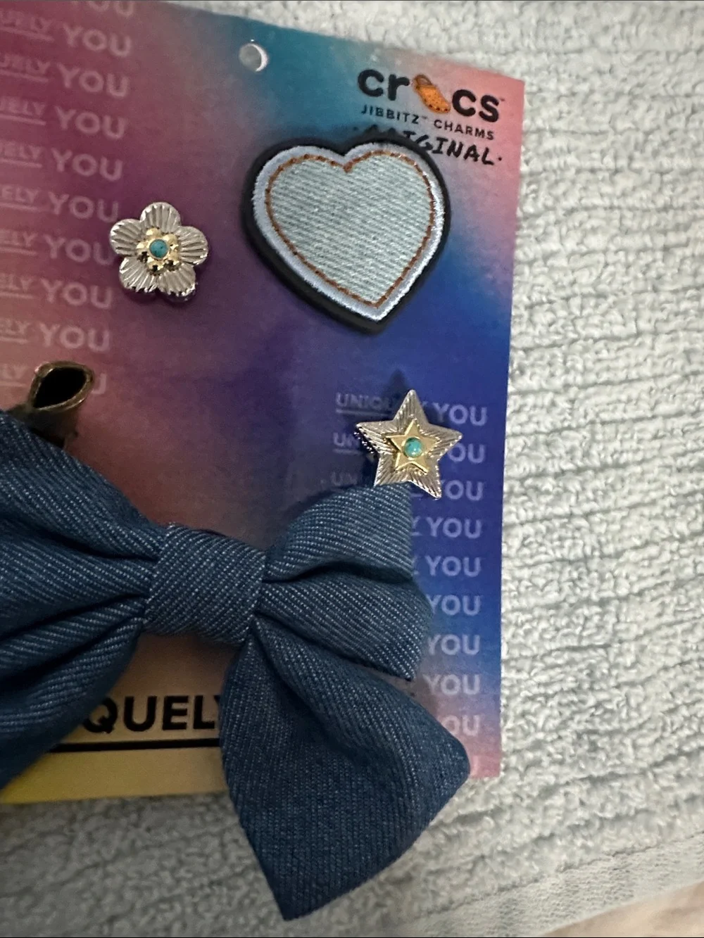 CROCS Denim Bow Croc Charms with Heart Patch & Silver Charms and cowgirl boot